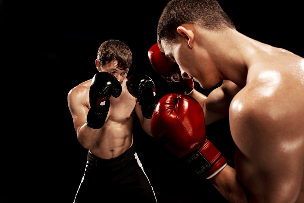 catégorie poids boxe anglaise : deux hommes font de la boxe